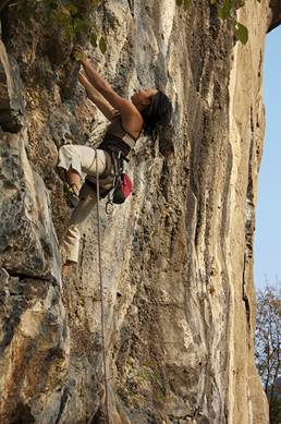 Rock climbing on one of Yangshuo’s rugged peaks